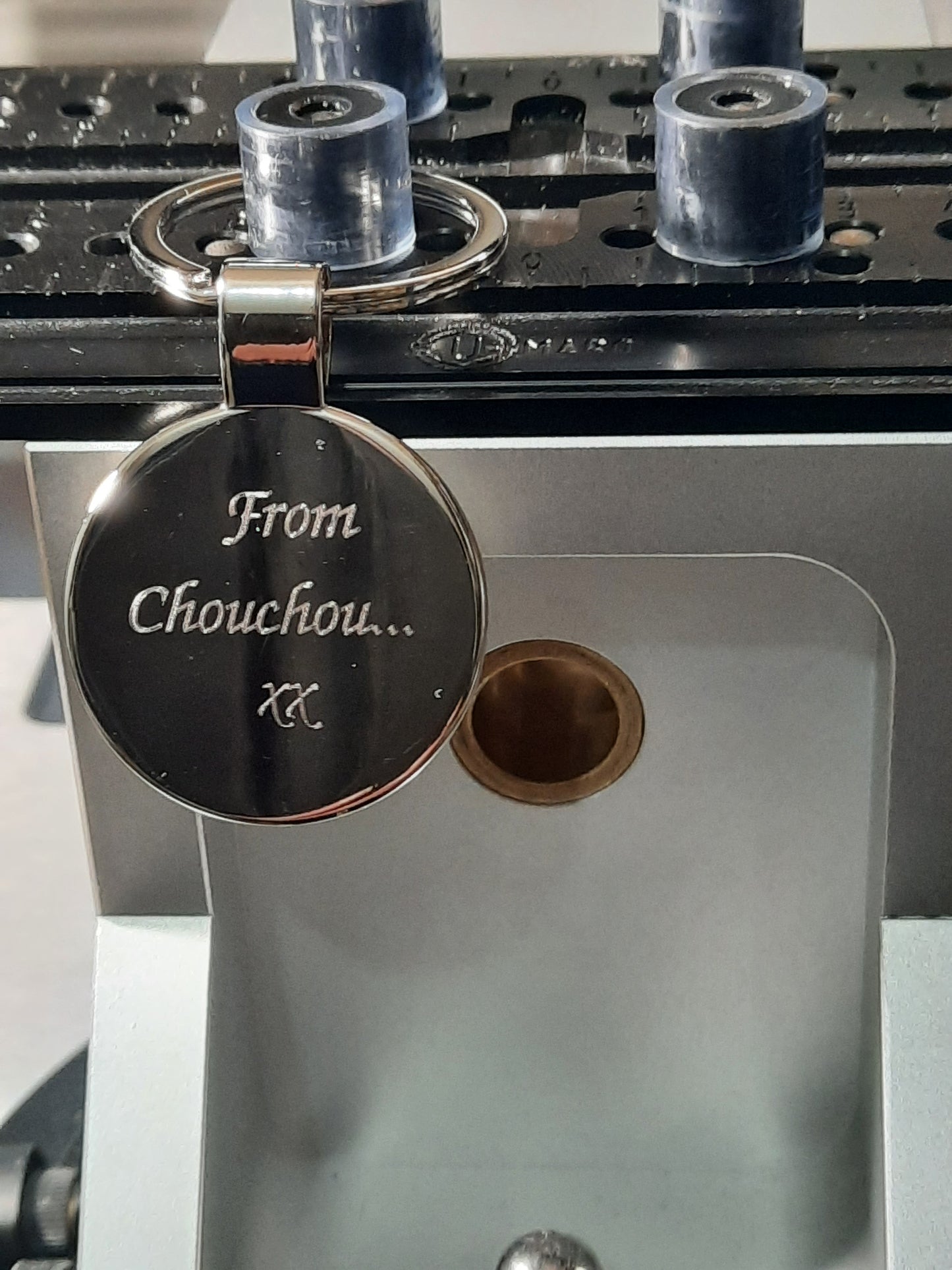 Personalised Golf Lover Keyring with engraved modern font that says "From Chouchou xx" on the back.