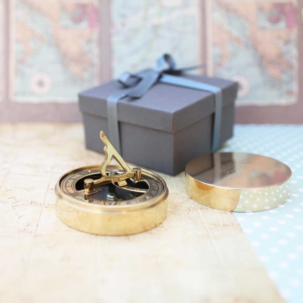 Engraved Compass Gift shows gift box with ribbon