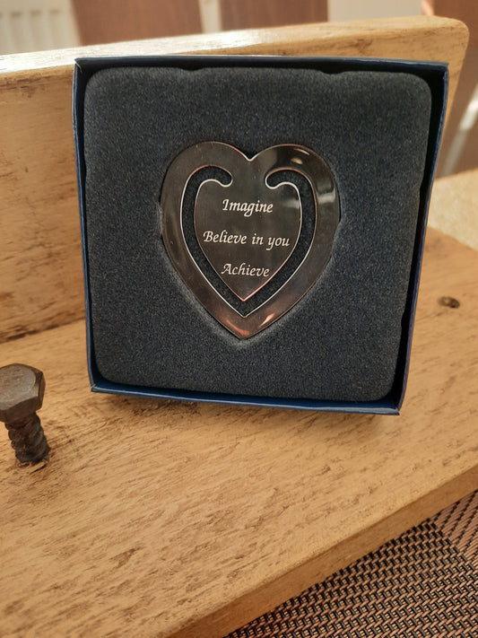 Personalised Engraved Bookmark Love Heart Shaped inside the gift box that says "Imagine Believe in you Achieve"