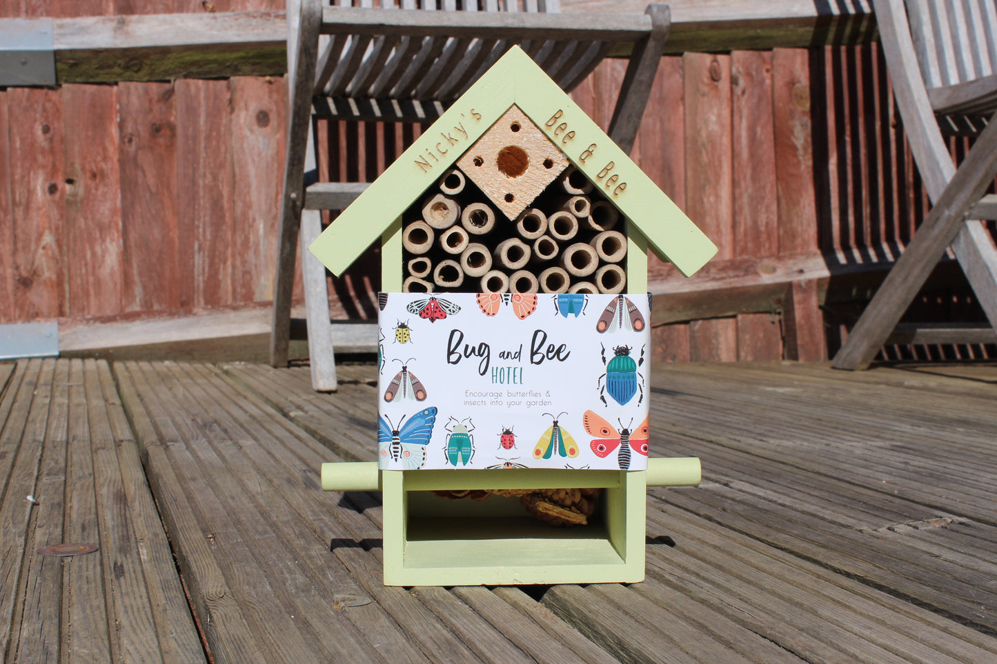A bug and bee insect home with personalised wordings that says"Nicky's" "Bee & Bee"