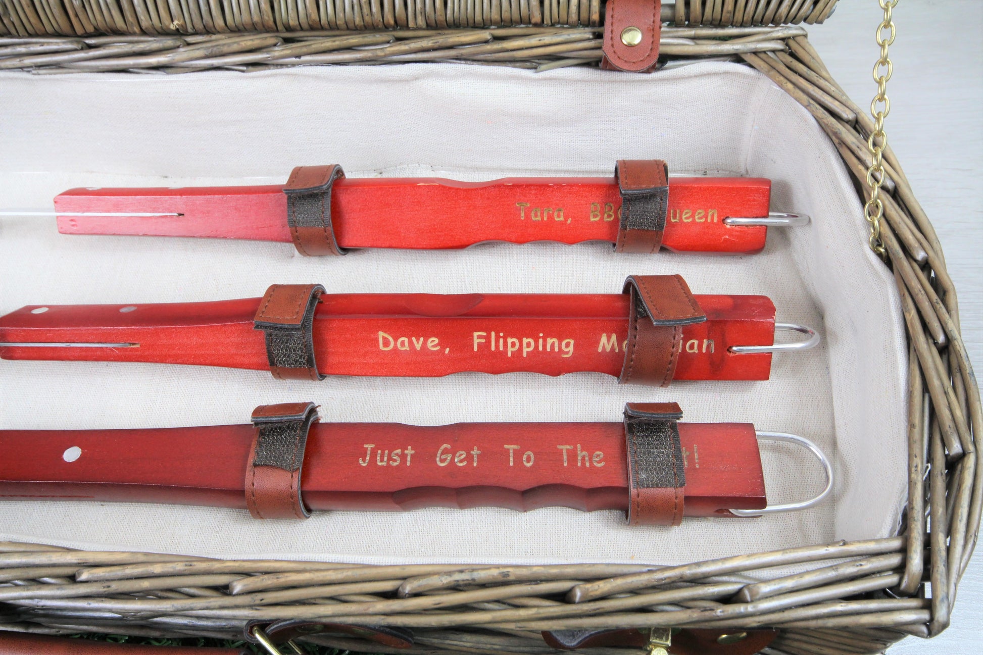3 Wooden handled personalised barbecue tool that says "Tara, BBQ Queen" "Dave, Flipping Magician" "Just Get To The Point"