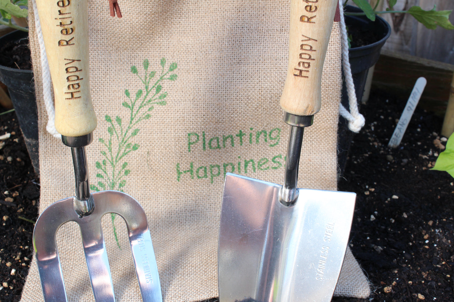 close up of engraving on garden trowel and Fork