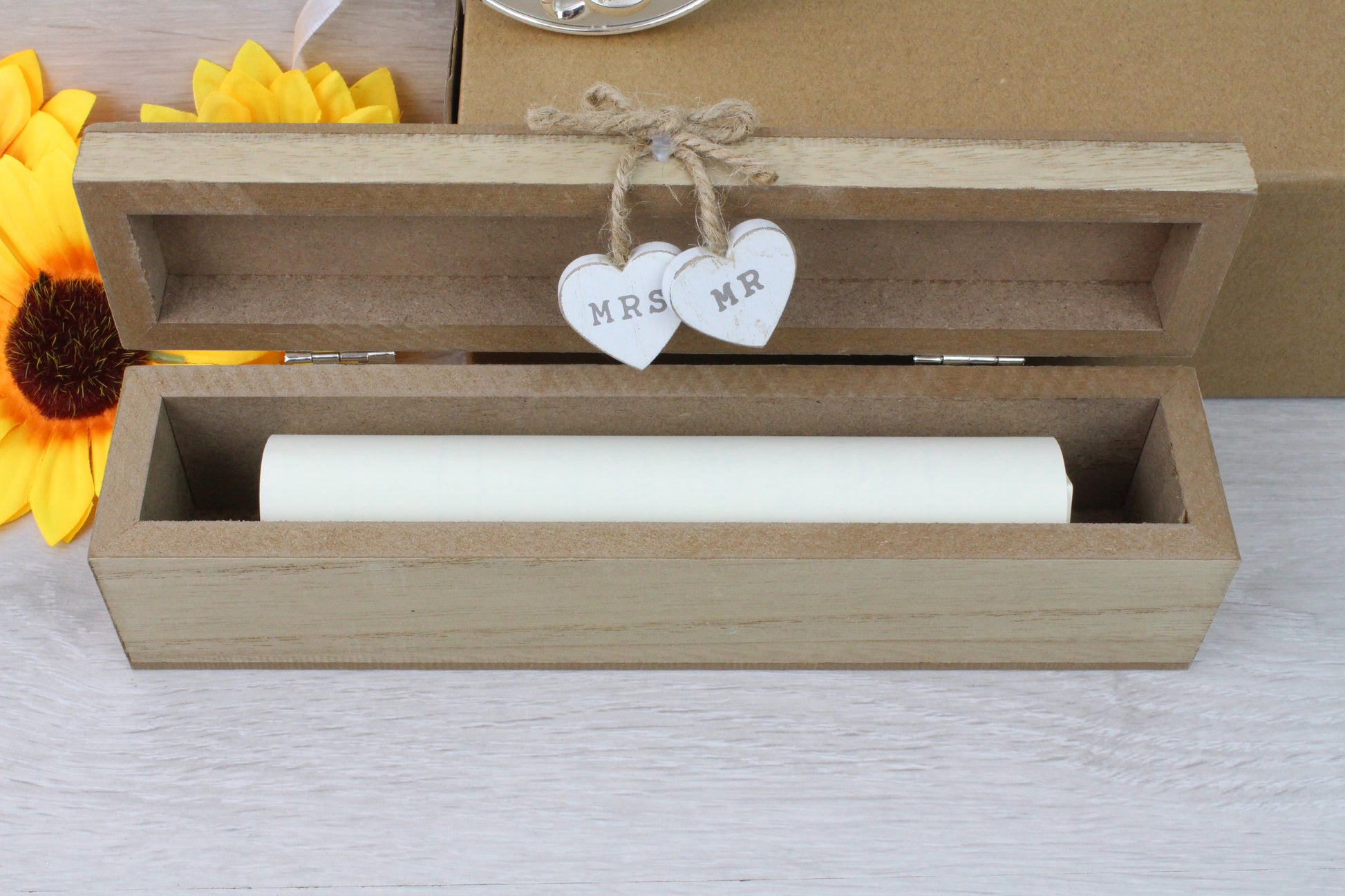 The Personalised Wedding Certificate Holder shows what it looks like inside the box, with a certificate as a sample.