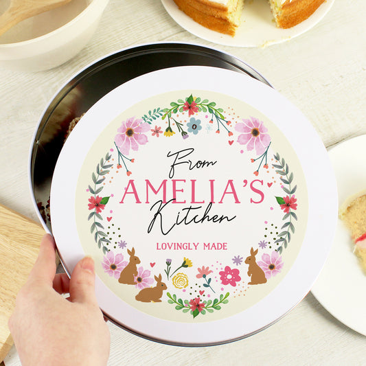 Personalised Floral Cake Tin that says "From AMELIA'S Kitchen LOVIINGLY MADE"