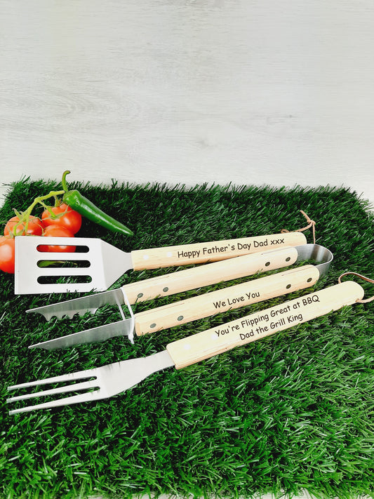 Personalised BBQ Tool Set with 4 small tomatoes and 1 green chili. Engraved words on fork "You're Flipping Great at BBQ Dad the Grill King", for tong "We Love You" and for spatula "Happy Father's Day Dad xxx"