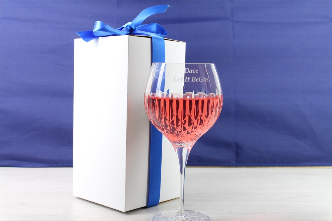 Full picture shot with personalised and engraved gin glass together with the gift box.
